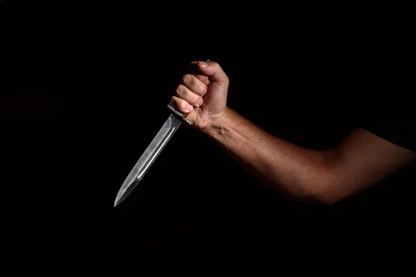 Mans hand med en kniv — Stockfoto