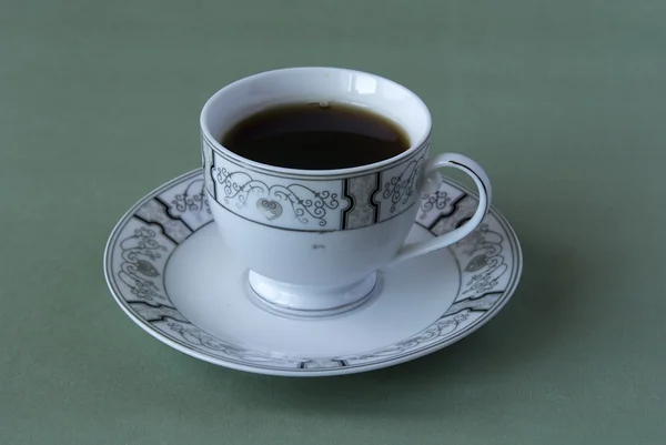 Tasse Tee auf einem Teller — Stockfoto