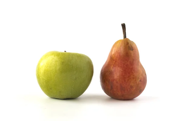 Green apple and red plum — Stock Photo, Image