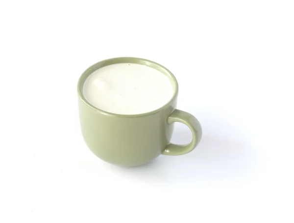 Una tazza di latte isolato su bianco Immagini Stock Royalty Free