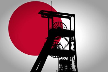 Arka planda Japon Bayrağı ve ön planda Kömür Madeni Dönme Dönme Dönme Tekerleği Simülasyonu. Yaklaşan enerji krizinin sembolü