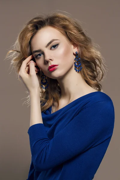 Girl in blue jewelry — Stock Photo, Image