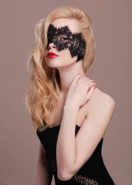 Young beautiful woman with mask — Stock Photo, Image