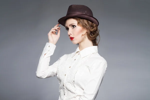 Fashionable girl in hat — Stock Photo, Image