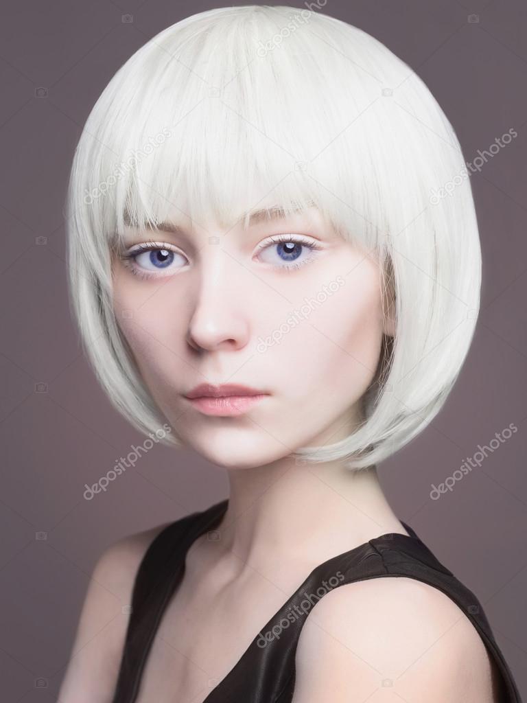 beautiful blond young woman. hairstyle cosmic girl