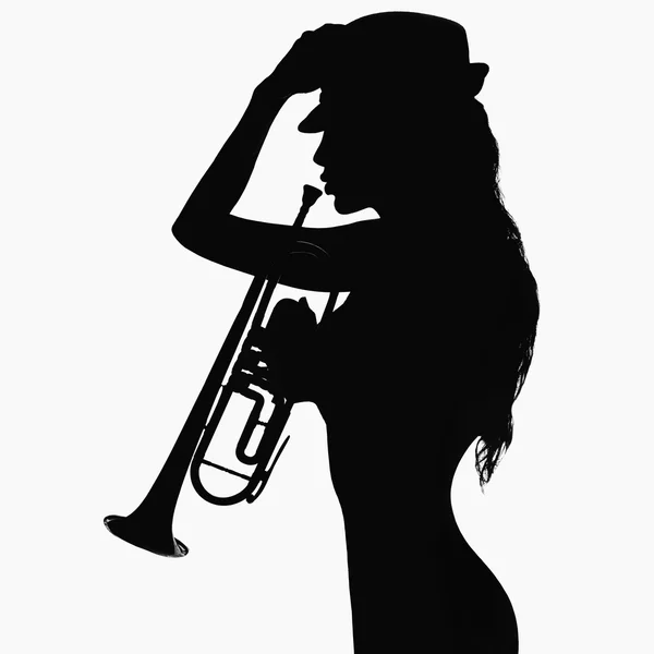 Flicka i hatt med trumpet — Stockfoto