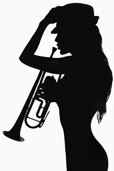 Girl in hat with trumpet — Stock Photo, Image