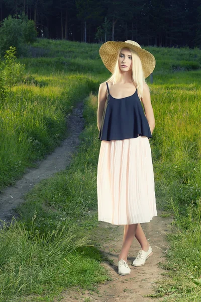 Beauty blonde in hat.summer forest — Zdjęcie stockowe