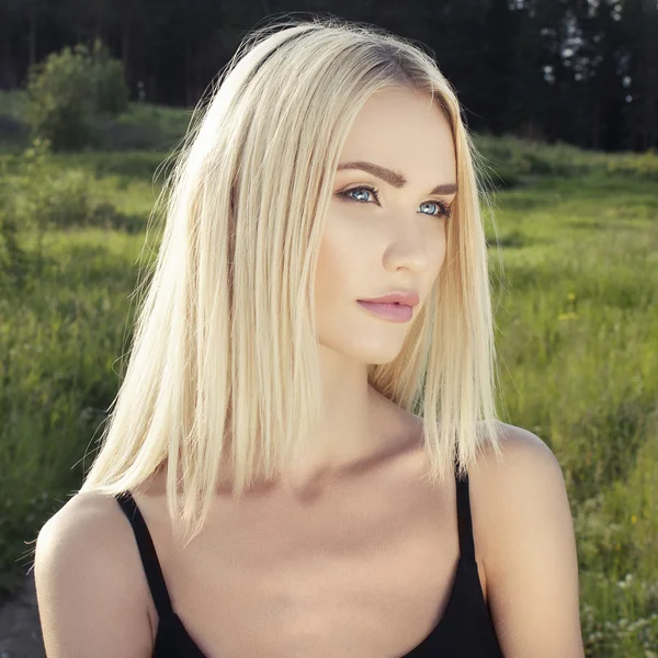 Beautiful Blond young Woman in Forest — Stok fotoğraf