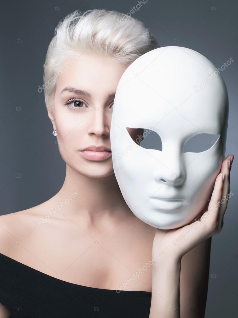 Blond lady with mask Stock Photo by ©photoagents 85148664