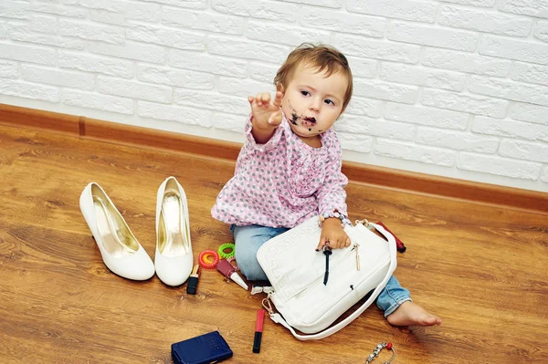 cute girl playing house with my mother's cosmetics