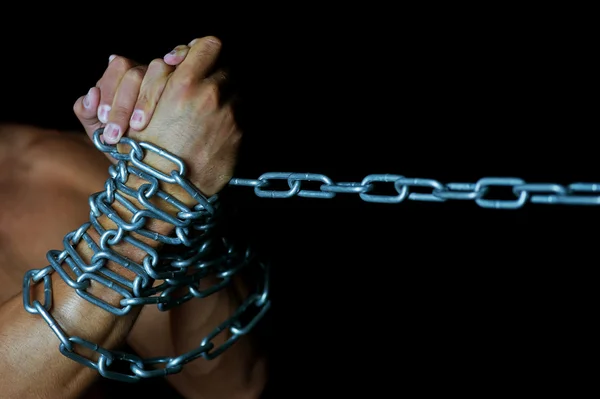 Man's hands in chains — Stock Photo, Image