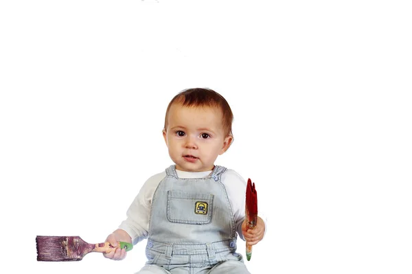 Retrato de niña con cepillos viejos, aislado sobre blanco — Foto de Stock