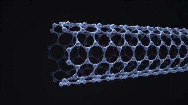 Karanlık arka planda karbon nanotüpü dönüyor. Kusursuz döngü. Grafenin yapısı, soyut nanoteknoloji altıgen geometrik formu yakın plan. 3d hazırlayıcı.