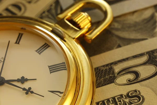 Tiempo y dinero. Tono de oro. Primer plano - Imagen de stock — Foto de Stock