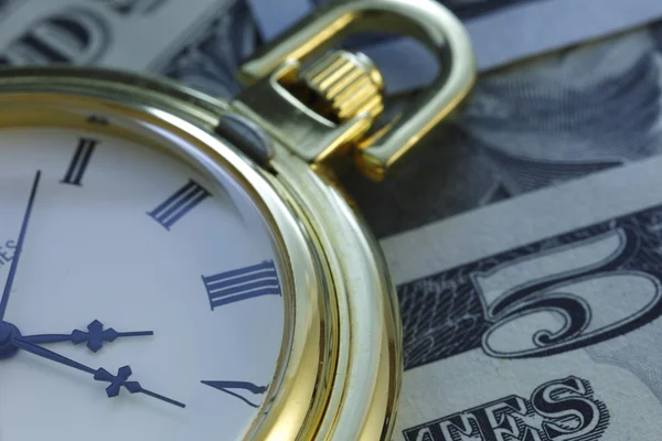 Tempo e dinheiro. Tom dourado. Close-up - Imagem stock — Fotografia de Stock
