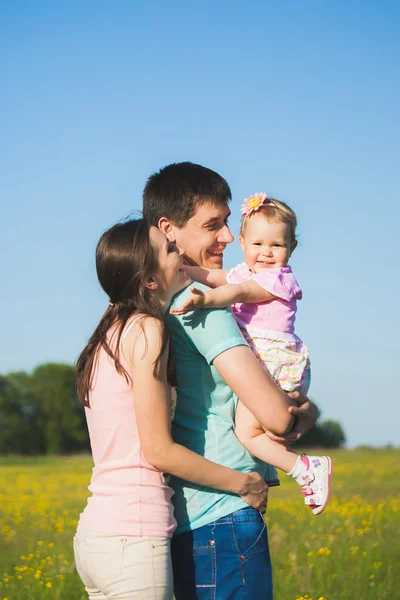 Family of three people having fun outside — Stock Photo, Image