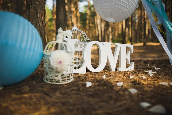 Wedding settings. Love - wooden inscription. — Stock Photo, Image