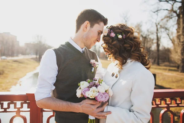 Young couple holding hands. — Stock Photo, Image