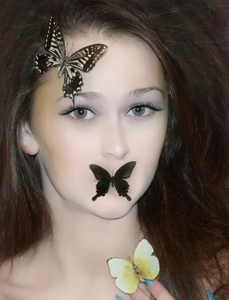 Girl with butterflies — Stock Photo, Image
