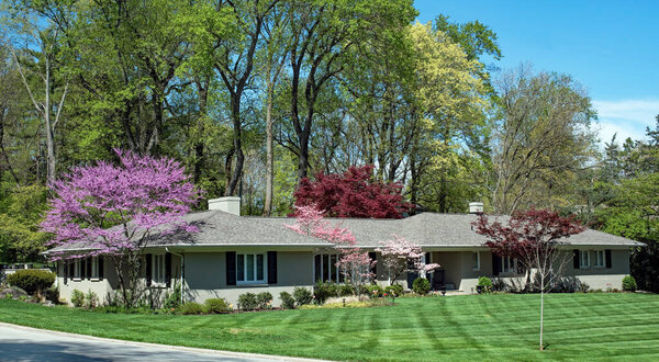 Sprawling Ranch House with Colorful Springtime Foliage