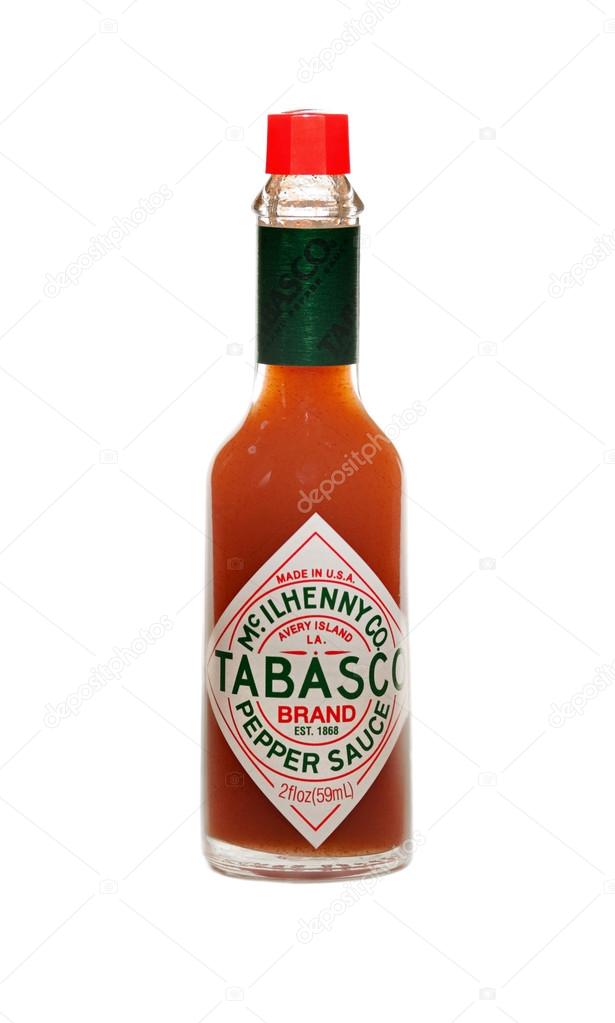 Dayton, Ohio, USA - March 1: Tabasco Sauce brand of bottled hot sauce isolated on white background, Dayton, Ohio March 1, 2011. TABASCO brand products are made by McIlhenny Company, founded in 1868 by Edmund McIlhenny on Avery Island, Louisiana.