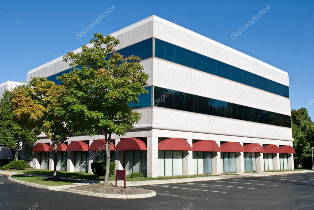 White Building with Red Awnings