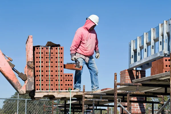 Overdracht van baksteen — Stockfoto