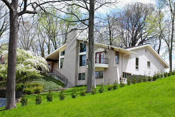 Springtime Stucco House on Hill