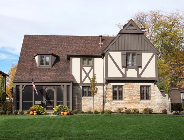 English Tudor Home with American Flag & Pumpkins — Stock Photo, Image