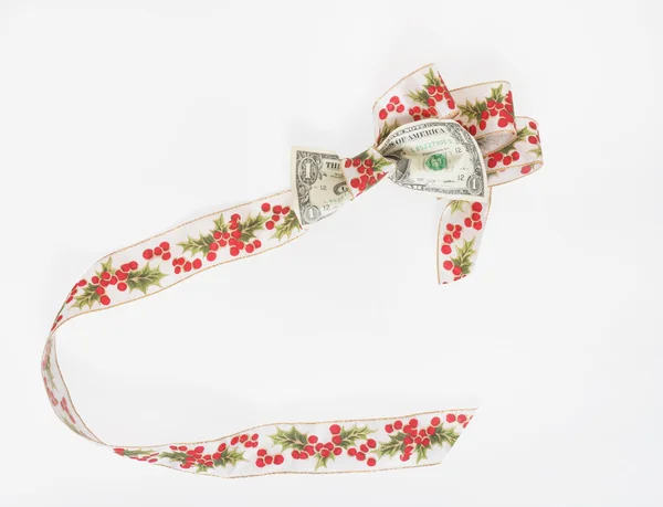 Dólar Bill amarrado com fita Holly — Fotografia de Stock