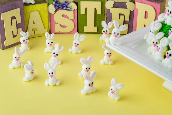Easter marshmallow  bunnies and Easter letters background.