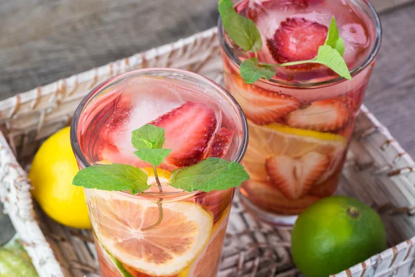 Citrus, straberry, mint infused water. — Stock Photo, Image