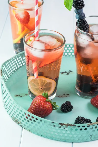 Citrus, berries, mint infused water. — Stock Photo, Image