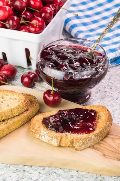Toast with cherry jam. — Stock Photo, Image
