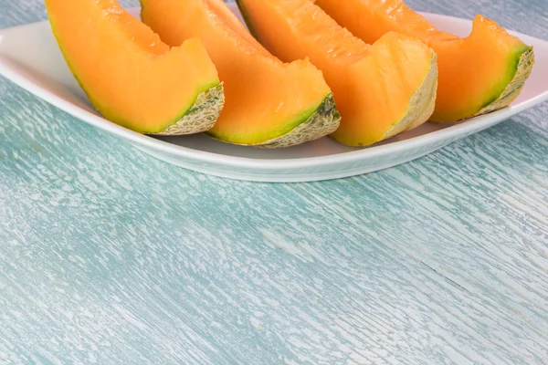 Stukken van cantaloupe meloen. — Stockfoto