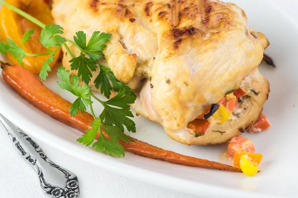 Grilled stuffed chicken. Stock Picture