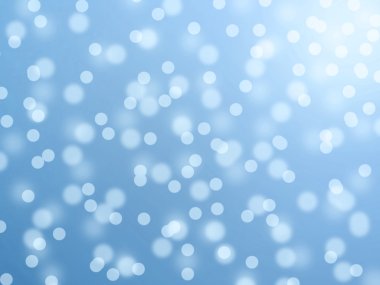 Bokeh mavi arka plan ile parlak ışık