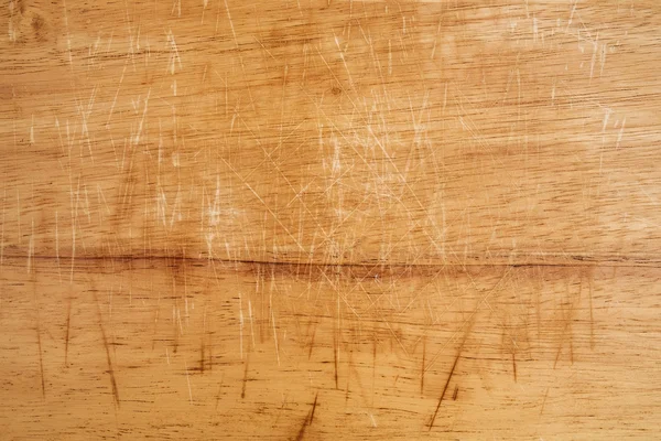 Old scratched wooden cutting board texture — Stock Photo, Image