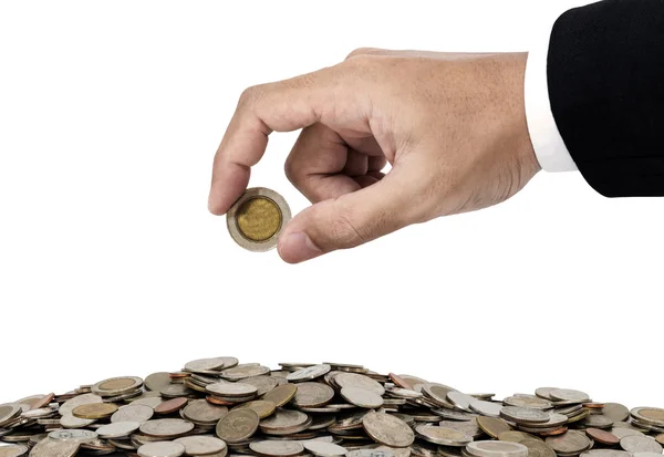 Podnikatel rukou dávat peníze mince, úspora peněz koncept, izolovaných na bílém pozadí — Stock fotografie
