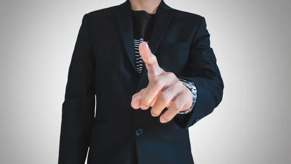 Empresario en traje casual señalando el dedo, enfoque selectivo en la mano — Foto de Stock