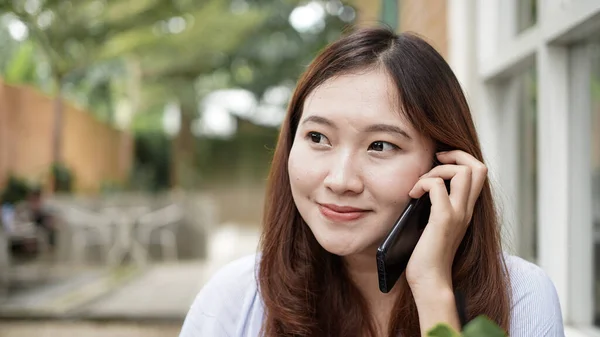 Asian Business Woman Calling Cafe Royalty Free Stock Images