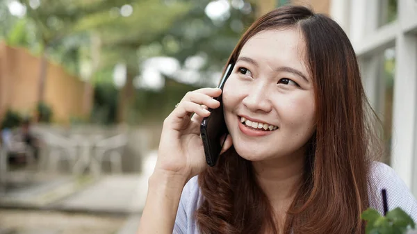 Asian Business Woman Calling Cafe Stock Photo
