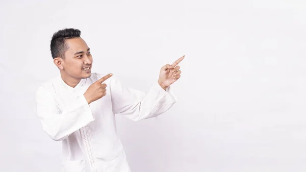 Asian Man Wearing Moslem Clothes Pointing Blank Screen Isolated White — Stock Photo, Image
