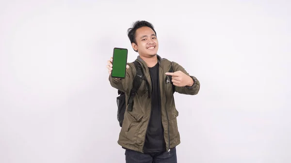 Young Man Wearing Bag Isolated White Background Pointed Greenscreen Phone — Stock Photo, Image