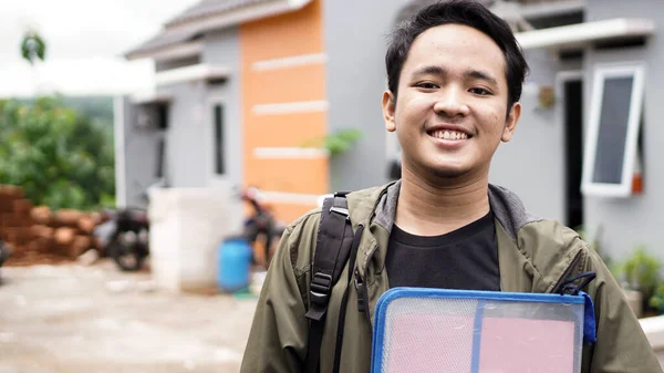 Portrait Young Men Standing Front New House Holding File — Stock Photo, Image