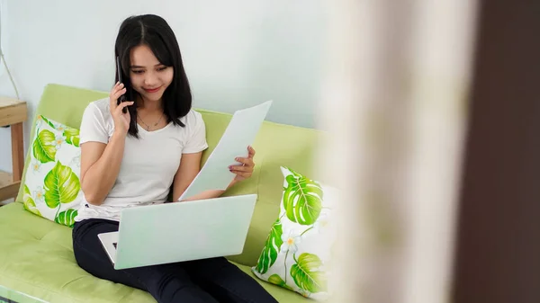 Beautiful Asian Women Working Home Using Laptop Calling Phone Sitting — Stock Photo, Image