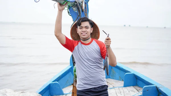 Happy Young Fisherman Beach Holding His Catch Fish Shows Front — Stock Photo, Image