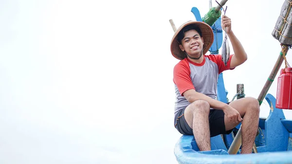 Happy Young Fisherman Beach Holding His Catch Fish Shows Front — Stock Photo, Image