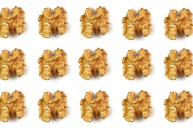 Beyaz arka planda ceviz çekirdeği deseni var. Üst görünüm